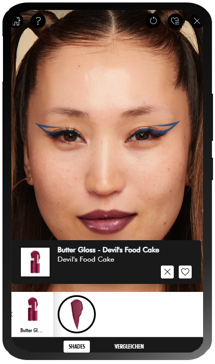 Anleitung fur das Virtual-Try-On-Tool von NYX Professional Makeup: Schritt 5: Junge Frau geschminkt mit einem blauen Epic Ink Liner und rotem Butter Gloss