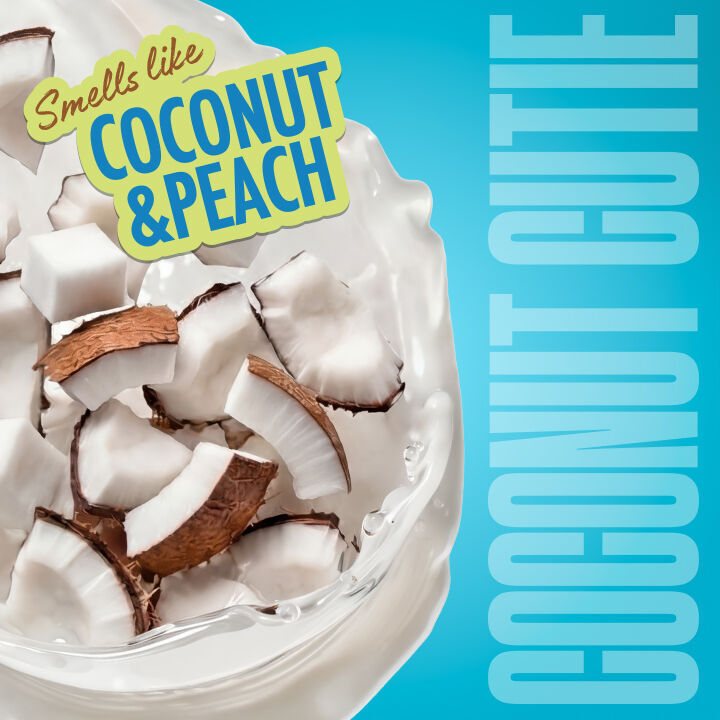 Frische Kokosnussstucke in einem weißen Cremesplash illustrieren den Duft „Coconut & Peach“ der Variante „Coconut Cutie“.