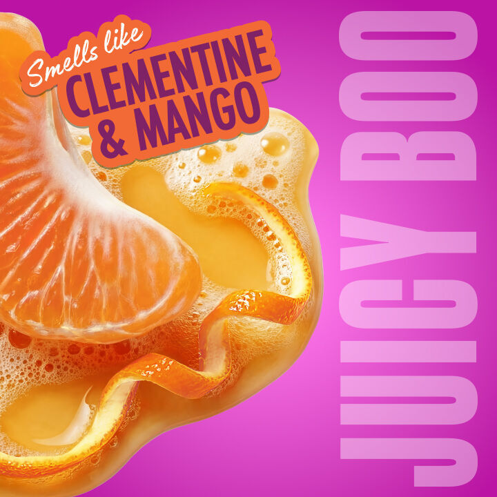 Eine saftige Clementine in einem fruchtigen Splash illustriert den Duft „Clementine & Mango“ der Variante „Juicy Boo“.