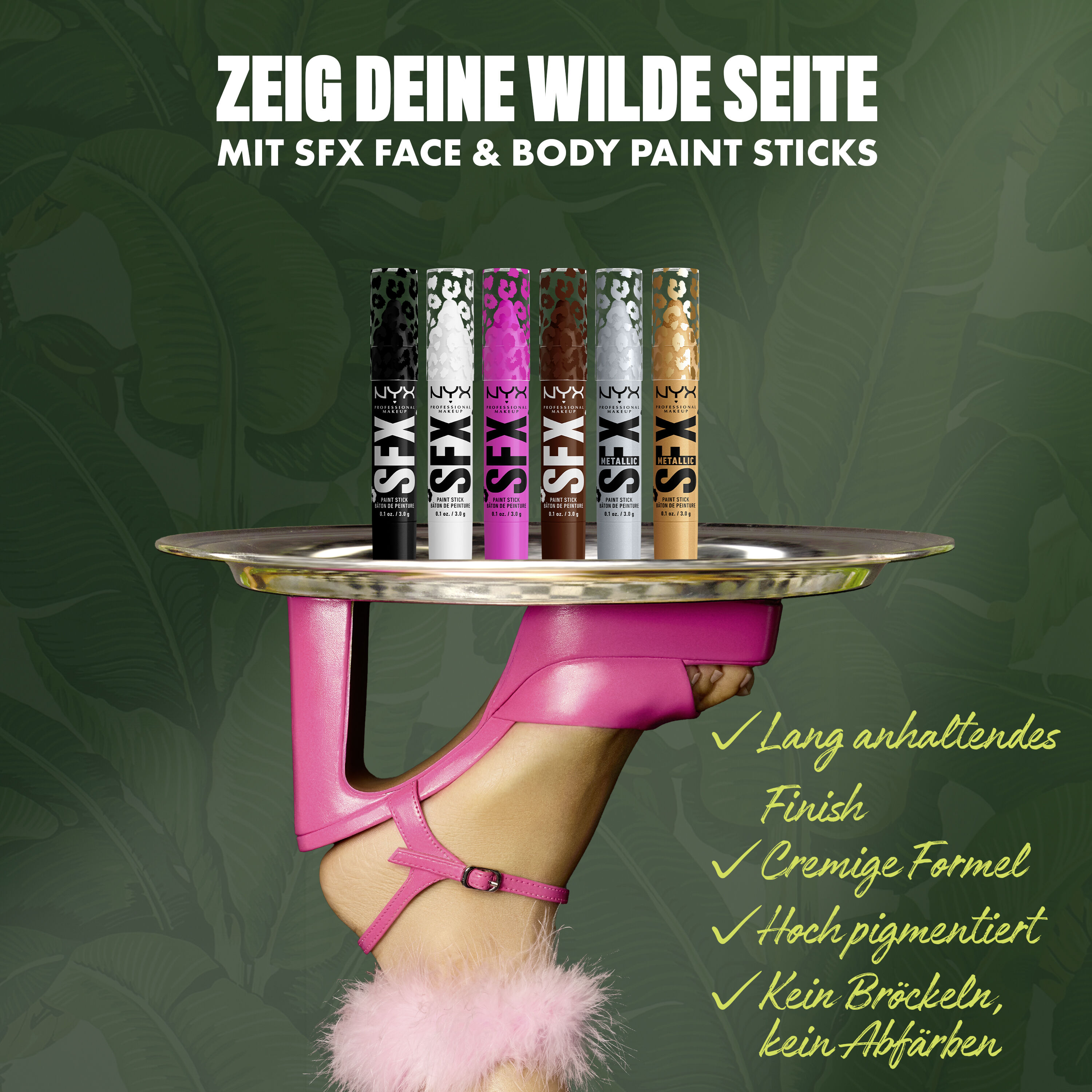 NYX Professional Makeup Party Animals SFX Face & Body Paint Sticks auf einem Tray, gehalten von einem Model mit pinken Handschuhen.