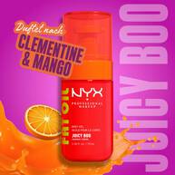 Das leuchtend rote Fat Oil Body Oil „Juicy Boo“ wird werblich mit einer Orange und dem Hinweis auf den Duft nach Clementine und Mango inszeniert.