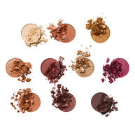 Zeigt zehn einzelne Haufen loser Lidschattenpigmente, die jede Farbe der NYX Professional Makeup Holiday Gingerbaddie Palette darstellen.